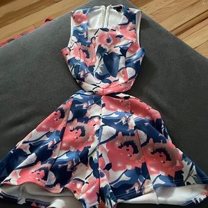Floral romper with a back cut out